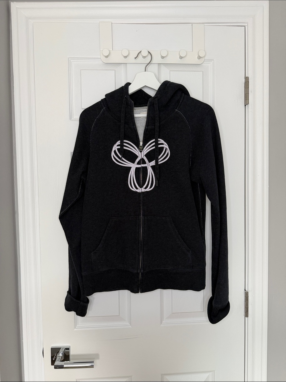 TNA Black Zip-Up Hoodie with White Rope Graphic